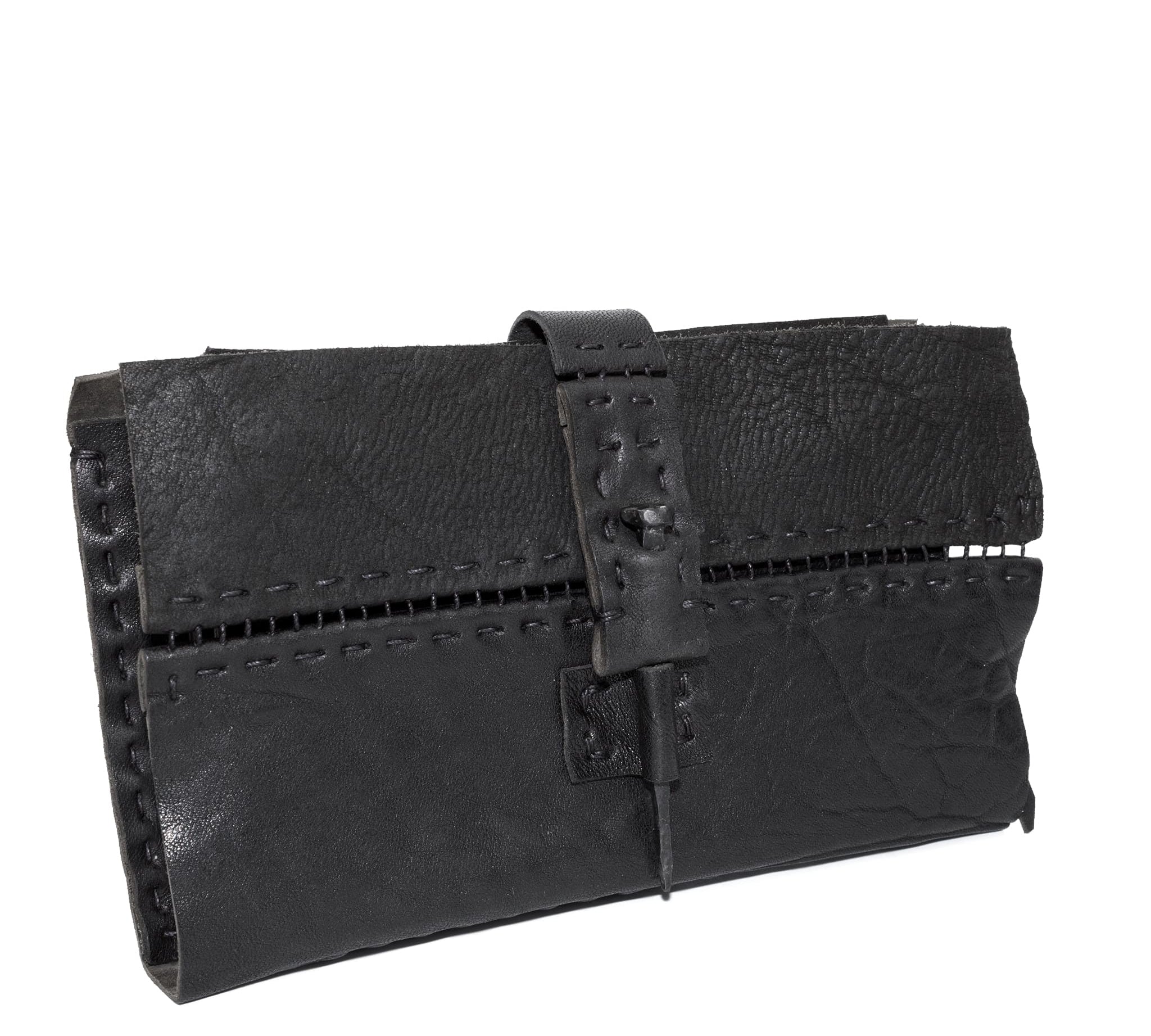 hand stitched matte black horse culatta leather long wallet with a technical open seam construction, multiple card slots and a large note pocket. the wallet is adorned with hand forged iron and .925 sterling silver hardware. available to buy online from artisanal leather studio atelier skn.