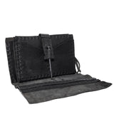 hand stitched matte black horse culatta leather long wallet with a technical open seam construction, multiple card slots and a large note pocket. the wallet is adorned with hand forged iron and .925 sterling silver hardware. available to buy online from artisanal leather studio atelier skn.