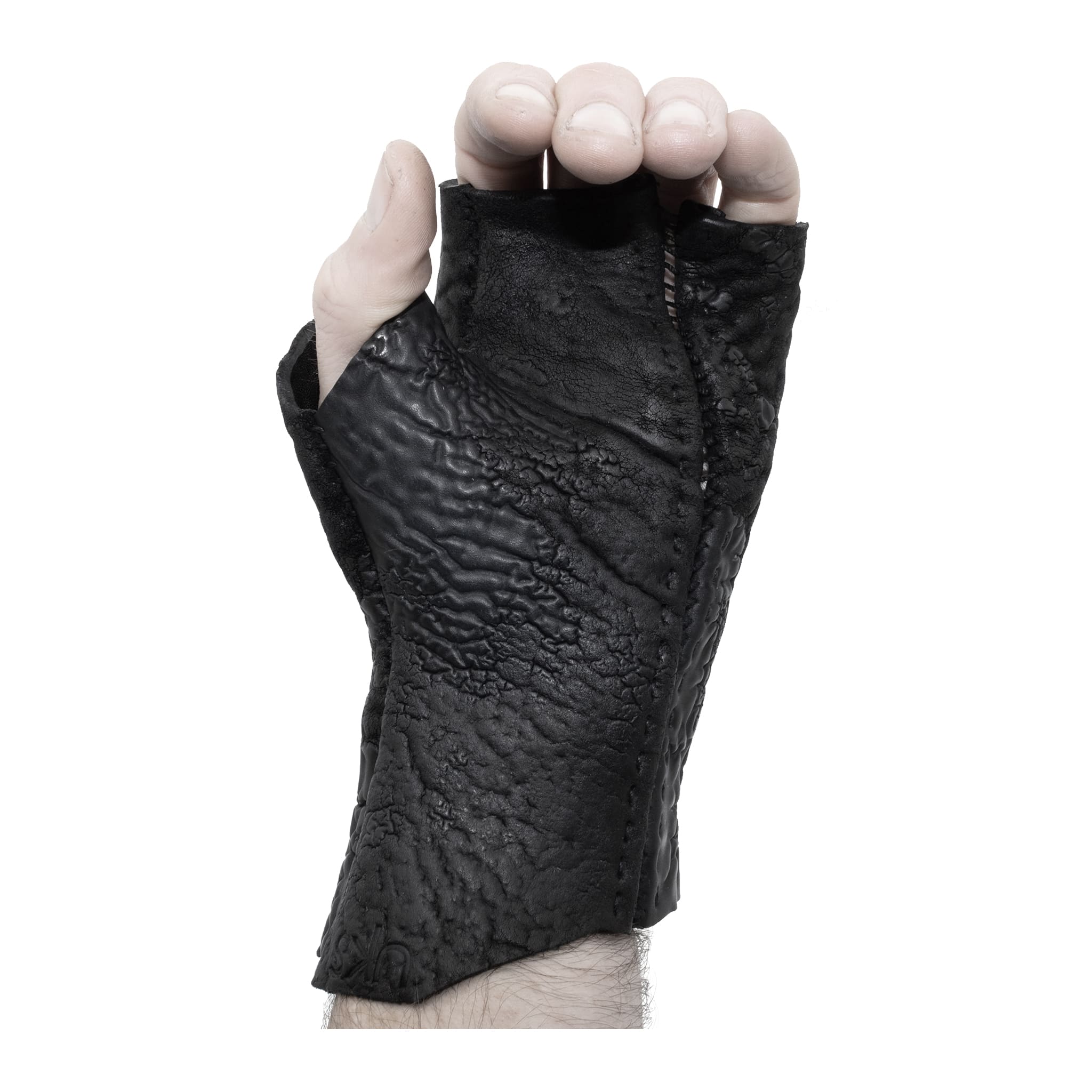 hand stitched over a 35hr period the washed reverse culatta gloves feature an open seam panel construction, a distressed black dye treatment and japanese linen thread for the stitching. the gloves are wet moulded on the body and available to buy online from avant garde leather studio atelierskn.com 