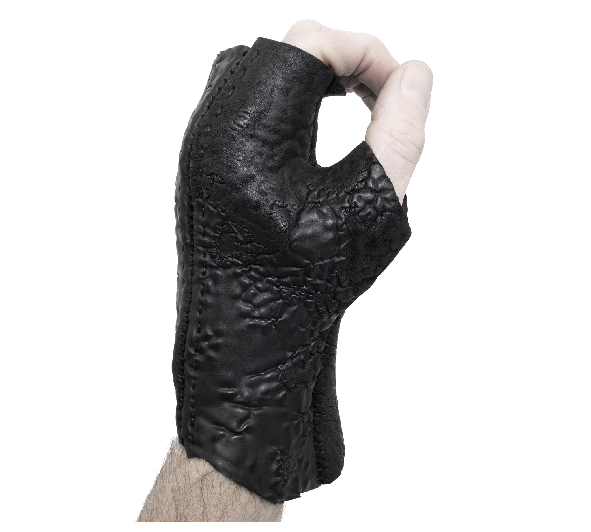 hand stitched over a 35hr period the washed reverse culatta gloves feature an open seam panel construction, a distressed black dye treatment and japanese linen thread for the stitching. the gloves are wet moulded on the body and available to buy online from avant garde leather studio atelierskn.com 