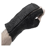 hand stitched over a 35hr period the washed reverse culatta gloves feature an open seam panel construction, a distressed black dye treatment and japanese linen thread for the stitching. the gloves are wet moulded on the body and available to buy online from avant garde leather studio atelierskn.com 