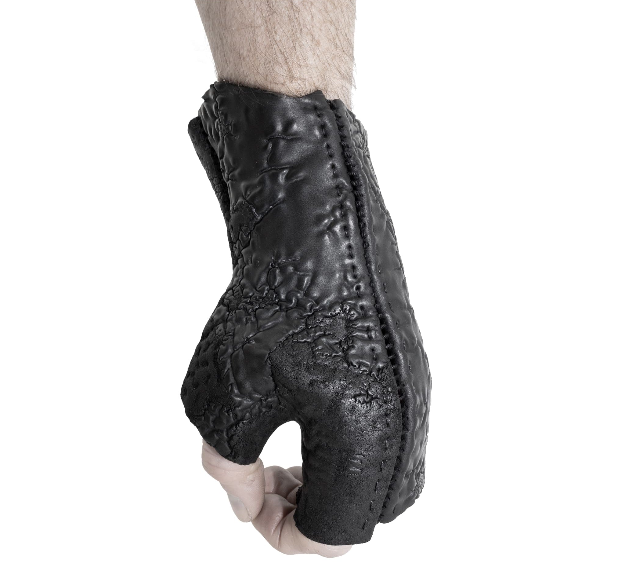 hand stitched over a 35hr period the washed reverse culatta gloves feature an open seam panel construction, a distressed black dye treatment and japanese linen thread for the stitching. the gloves are wet moulded on the body and available to buy online from avant garde leather studio atelierskn.com 