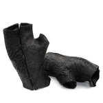 hand stitched over a 35hr period the washed reverse culatta gloves feature an open seam panel construction, a distressed black dye treatment and japanese linen thread for the stitching. the gloves are wet moulded on the body and available to buy online from avant garde leather studio atelierskn.com 