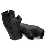 hand stitched over a 35hr period the washed reverse culatta gloves feature an open seam panel construction, a distressed black dye treatment and japanese linen thread for the stitching. the gloves are wet moulded on the body and available to buy online from avant garde leather studio atelierskn.com 