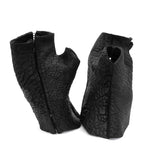 hand stitched over a 35hr period the washed reverse culatta gloves feature an open seam panel construction, a distressed black dye treatment and japanese linen thread for the stitching. the gloves are wet moulded on the body and available to buy online from avant garde leather studio atelierskn.com 