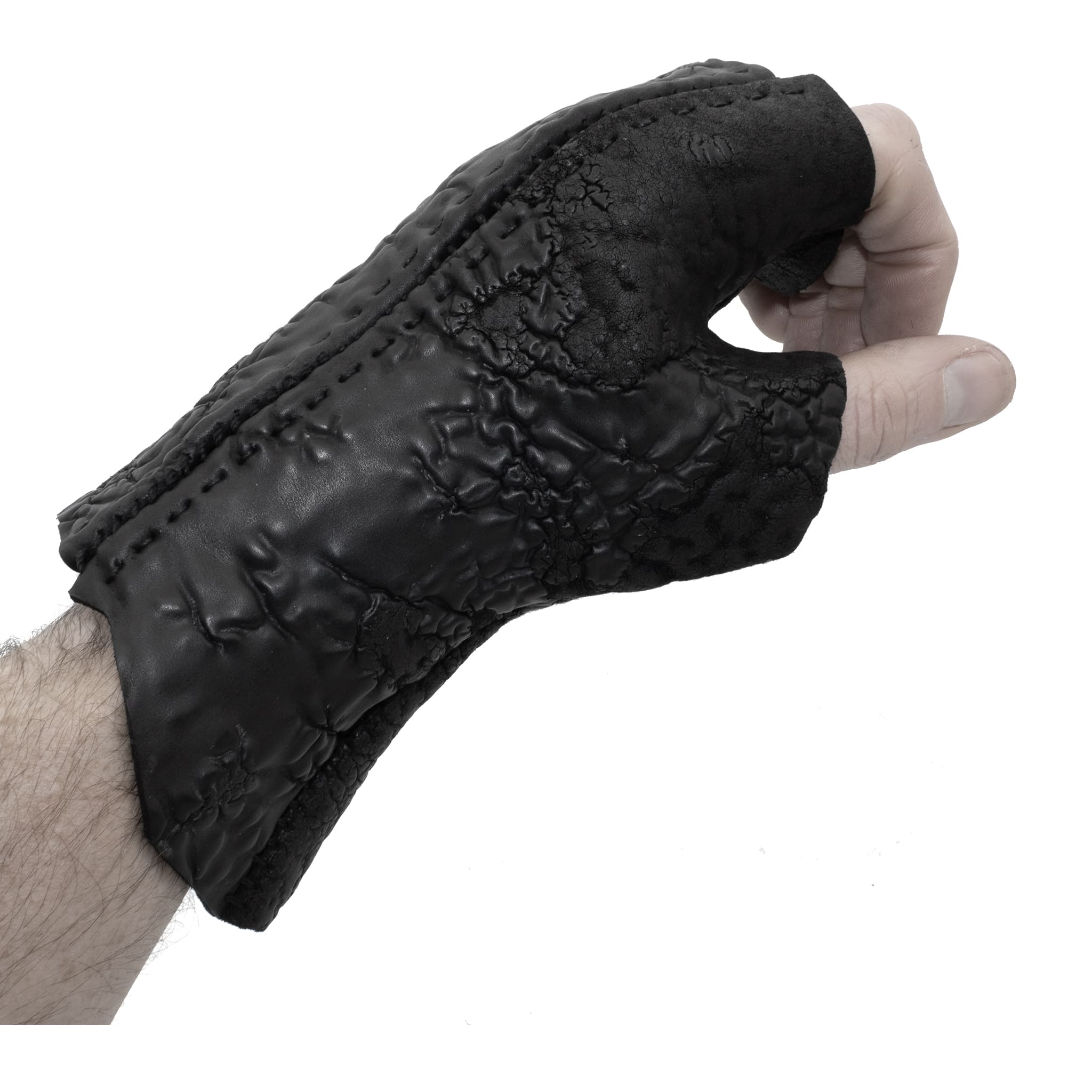 hand stitched over a 35hr period the washed reverse culatta gloves feature an open seam panel construction, a distressed black dye treatment and japanese linen thread for the stitching. the gloves are wet moulded on the body and available to buy online from avant garde leather studio atelierskn.com 