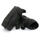 hand stitched over a 35hr period the washed horse culatta leather gloves feature deconstructed open seam panels, and a multiple layer absinthe dye treatment. the gloves are available to buy online from avant garde leather studio atelierskn.com
