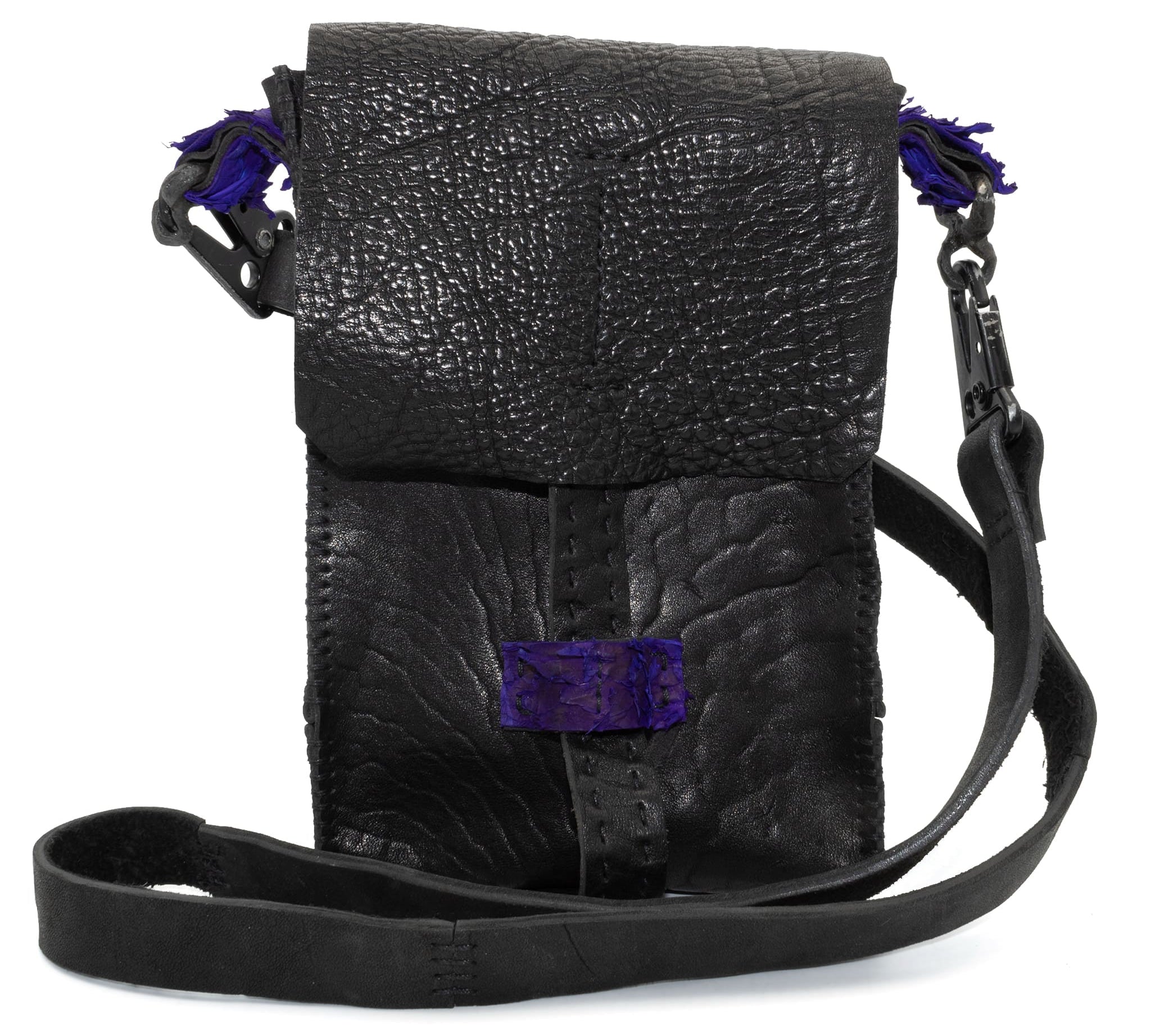 black washed culatta  and object dyed fish leather crossbody bag, with hand forged iron hardware available to buy online from avant garde leather studio atelierskn.com. an independent designer offering a fastidious collection of artisanal leather bags and accessories.