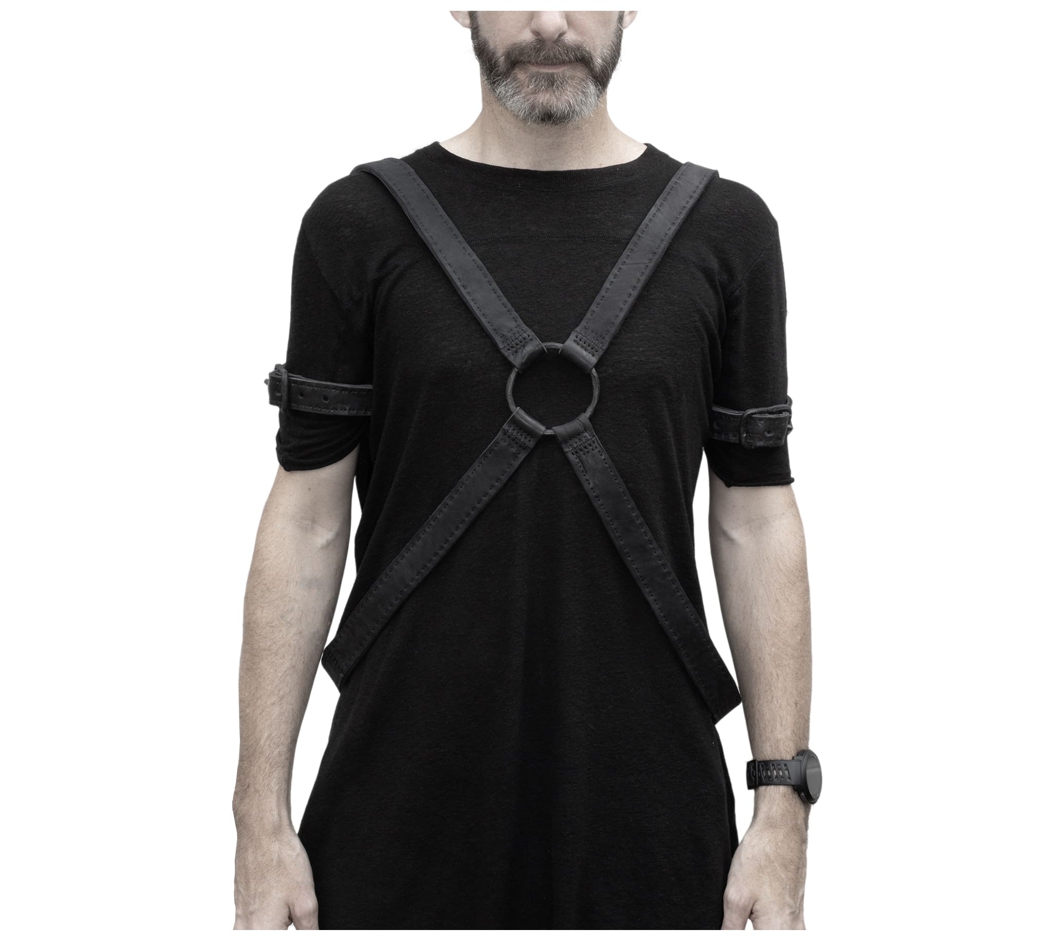 avant garde hand stitched horse culatta leather bicep belts, with an iron dye finish. the arm cuffs feature a minimal silhouette with tonal japanese linen stitching and hand forged iron buckle hardware. the arm belts are available to buy online from artisanal designer atelierskn.com 