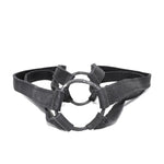 avant garde hand stitched horse culatta leather body harness, with an iron dye finish. the harness features a minimal silhouette with tonal japanese linen stitching and hand forged iron ring hardware. the leather harness is available to buy online from artisanal designer atelierskn.com 