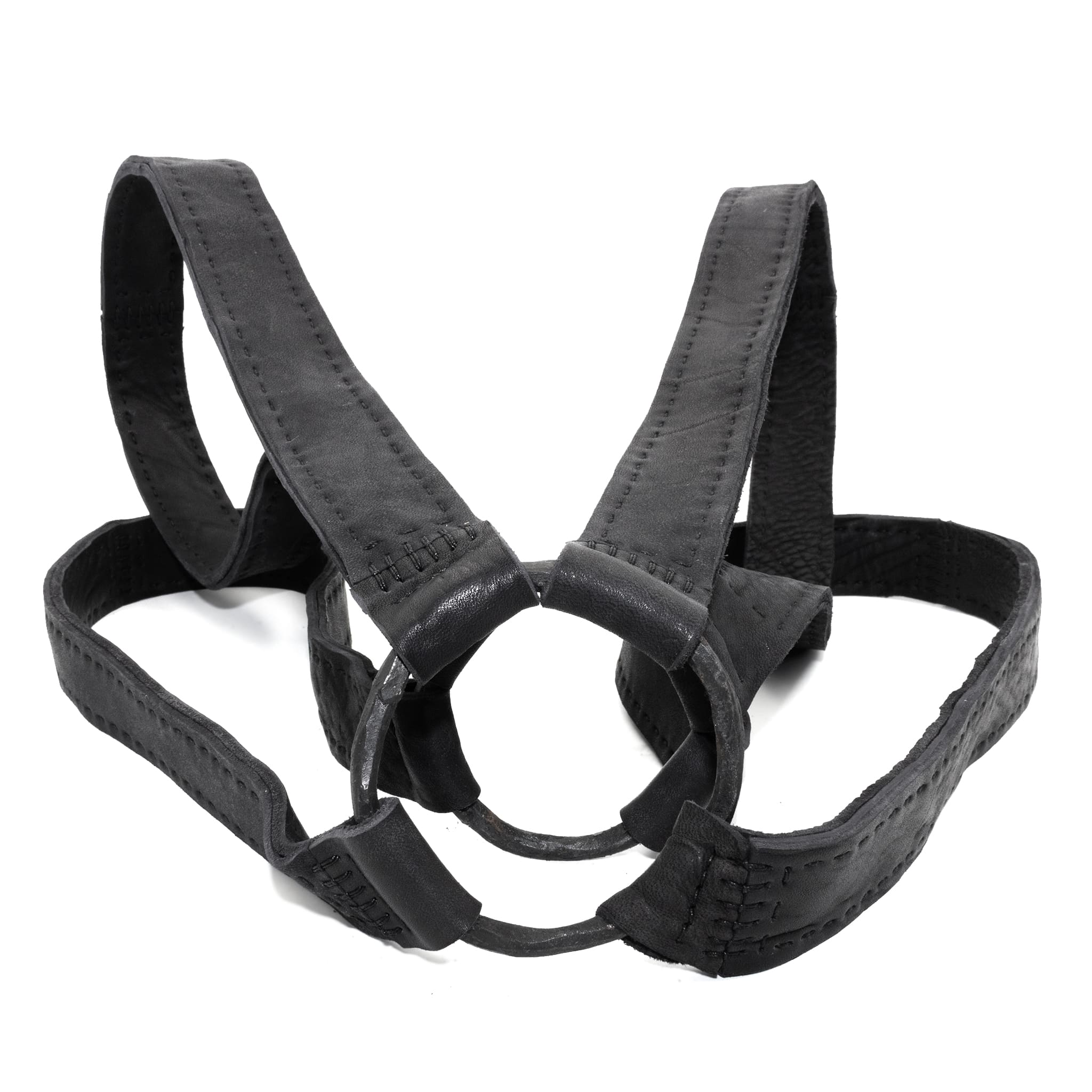 avant garde hand stitched horse culatta leather body harness, with an iron dye finish. the harness features a minimal silhouette with tonal japanese linen stitching and hand forged iron ring hardware. the leather harness is available to buy online from artisanal designer atelierskn.com 