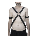 avant garde hand stitched horse culatta leather body harness, with an iron dye finish. the harness features a minimal silhouette with tonal japanese linen stitching and hand forged iron ring hardware. the leather harness is available to buy online from artisanal designer atelierskn.com 