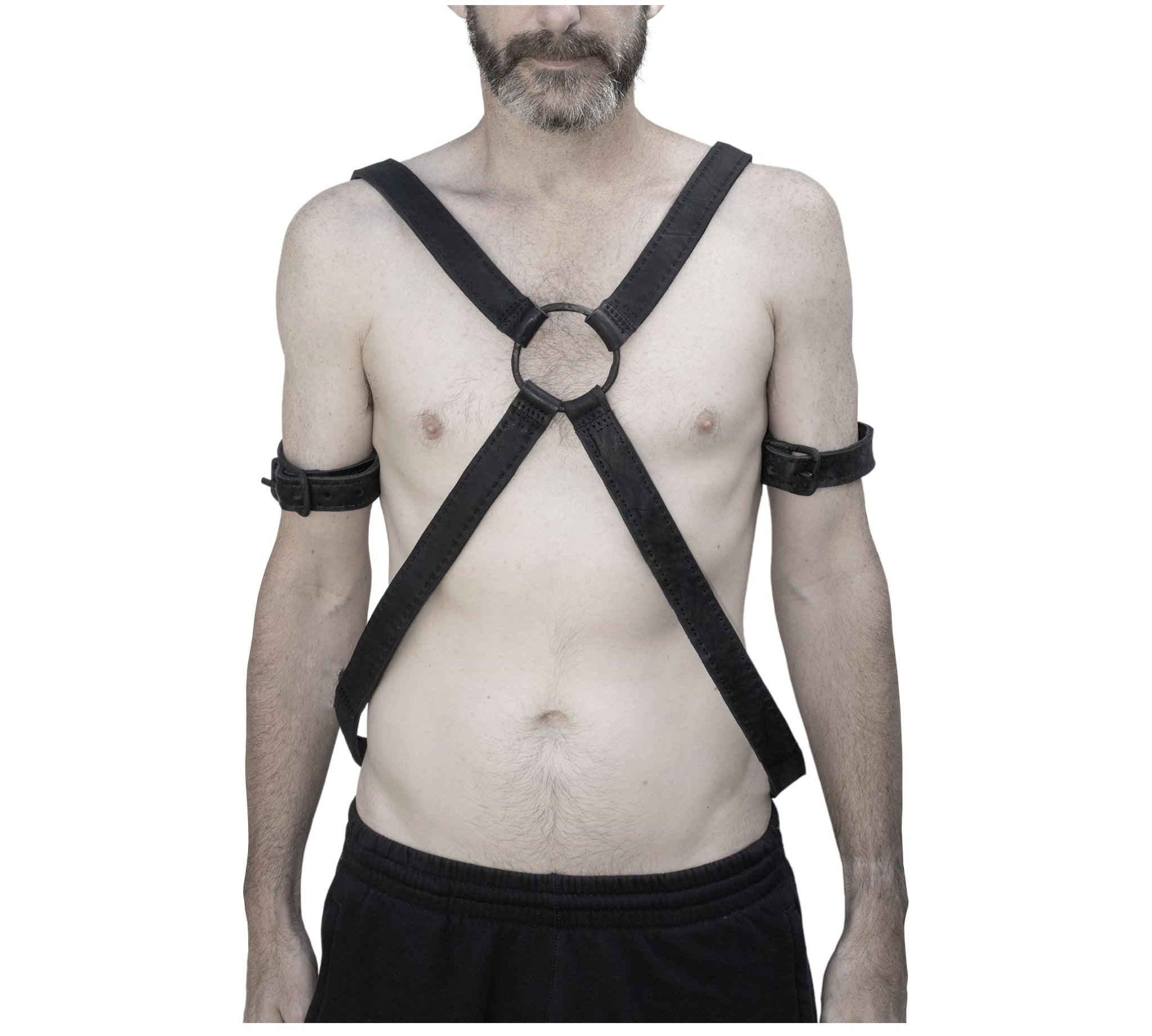 avant garde hand stitched horse culatta leather body harness, with an iron dye finish. the harness features a minimal silhouette with tonal japanese linen stitching and hand forged iron ring hardware. the leather harness is available to buy online from artisanal designer atelierskn.com 