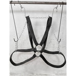 avant garde hand stitched horse culatta leather body harness, with an iron dye finish. the harness features a minimal silhouette with tonal japanese linen stitching and hand forged iron ring hardware. the leather harness is available to buy online from artisanal designer atelierskn.com 
