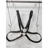 avant garde hand stitched horse culatta leather body harness, with an iron dye finish. the harness features a minimal silhouette with tonal japanese linen stitching and hand forged iron ring hardware. the leather harness is available to buy online from artisanal designer atelierskn.com 
