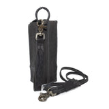 iron dyed horse leather phone pouch with an adjustable shoulder strap and small carry handle. distressed iron hardware compliments the grain of the leather. Shop online from avant garde leather studio atelierskn.com.