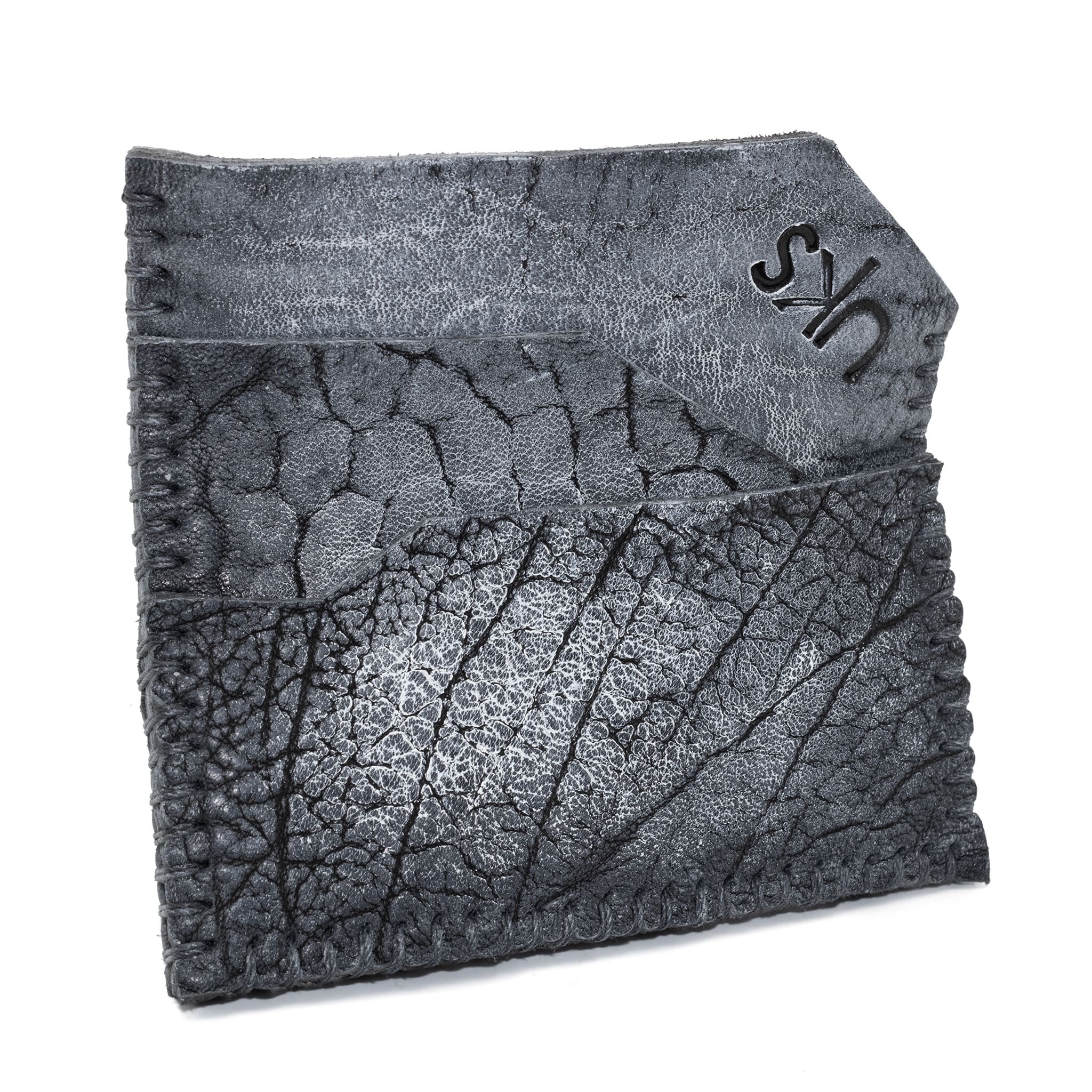 hand stitched over an 8hr period the washed culatta cardholder features multiple card slots, hand stitched overlock sides and a pigmented wax finish. the cardholder is available to buy online from avant garde leather studio atelierskn.com