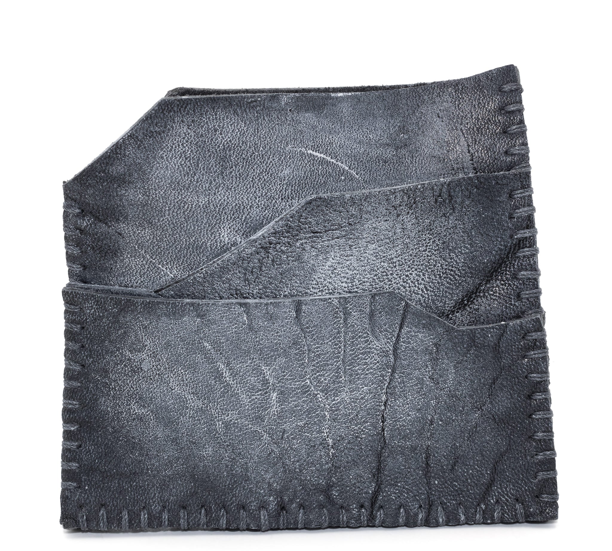hand stitched over an 8hr period the washed culatta cardholder features multiple card slots, hand stitched overlock sides and a pigmented wax finish. the cardholder is available to buy online from avant garde leather studio atelierskn.com