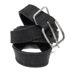 a double layered object dyed matte black full grain reverse horse culatta leather belt with a hand forged oxidised .925 sterling silver buckle for men and women. expertly hand sewn by independent UK based artisanal designer atelier SKN.