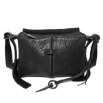 medium sized hand stitched washed horse culatta leather shoulder bag with an object dyed matte black finish. the bag features an open seam construction with a flap closure, riri zipper fastening and hand forged iron and silver hardware. the black leather bag is finished with an adjustable leather strap and is available to buy online from avant garde leather studio atelierskn.com.
