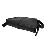 medium sized hand stitched washed horse culatta leather shoulder bag with an object dyed matte black finish. the bag features an open seam construction with a flap closure, riri zipper fastening and hand forged iron and silver hardware. the black leather bag is finished with an adjustable leather strap and is available to buy online from avant garde leather studio atelierskn.com.