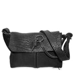 medium sized hand stitched washed horse culatta leather shoulder bag with an object dyed matte black finish. the bag features an open seam construction with a flap closure, riri zipper fastening and hand forged iron and silver hardware. the black leather bag is finished with an adjustable leather strap and is available to buy online from avant garde leather studio atelierskn.com.