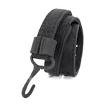 avant garde hand stitched horse culatta leather hook belt, with an iron dye finish. the belt features a minimal deconstructed silhouette with tonal japanese linen stitching and hand forged iron hook fastening. available to buy online from artisanal designer atelierskn.com 