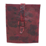 hand dyed blood red horse leather ebook pochette with a strap closure and hand stitched available to buy online at atelierskn.com