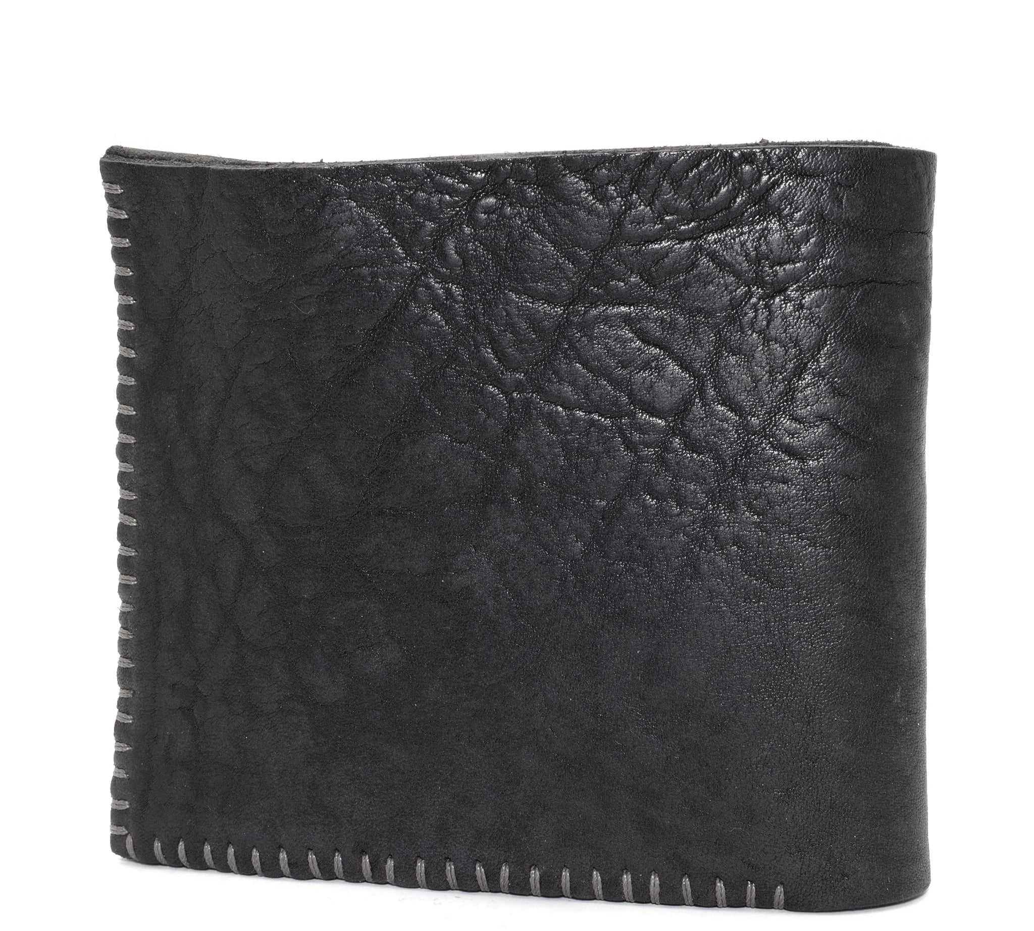 the classic wedge 6 pocket bifold wallet crafted from a supple matte black horse culatta leather with contrasting kudu leather card pockets available to buy online from artisanal leather studio atelierskn.com