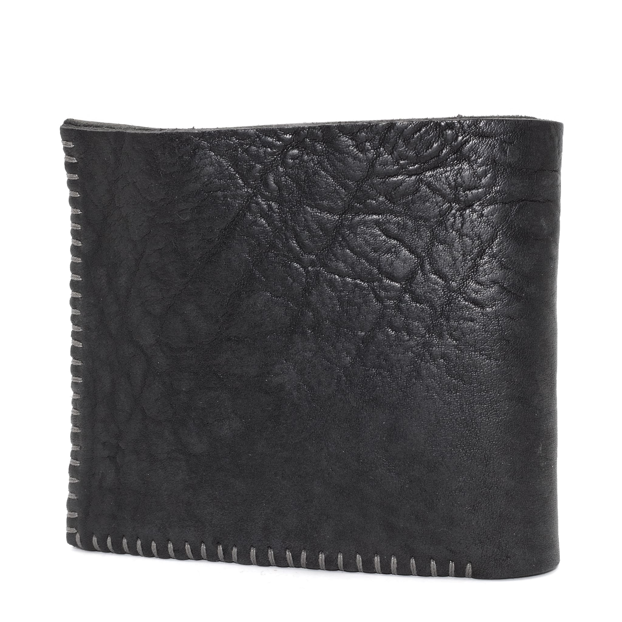 the classic wedge 6 pocket bifold wallet crafted from a supple matte black horse culatta leather with contrasting kudu leather card pockets available to buy online from artisanal leather studio atelierskn.com