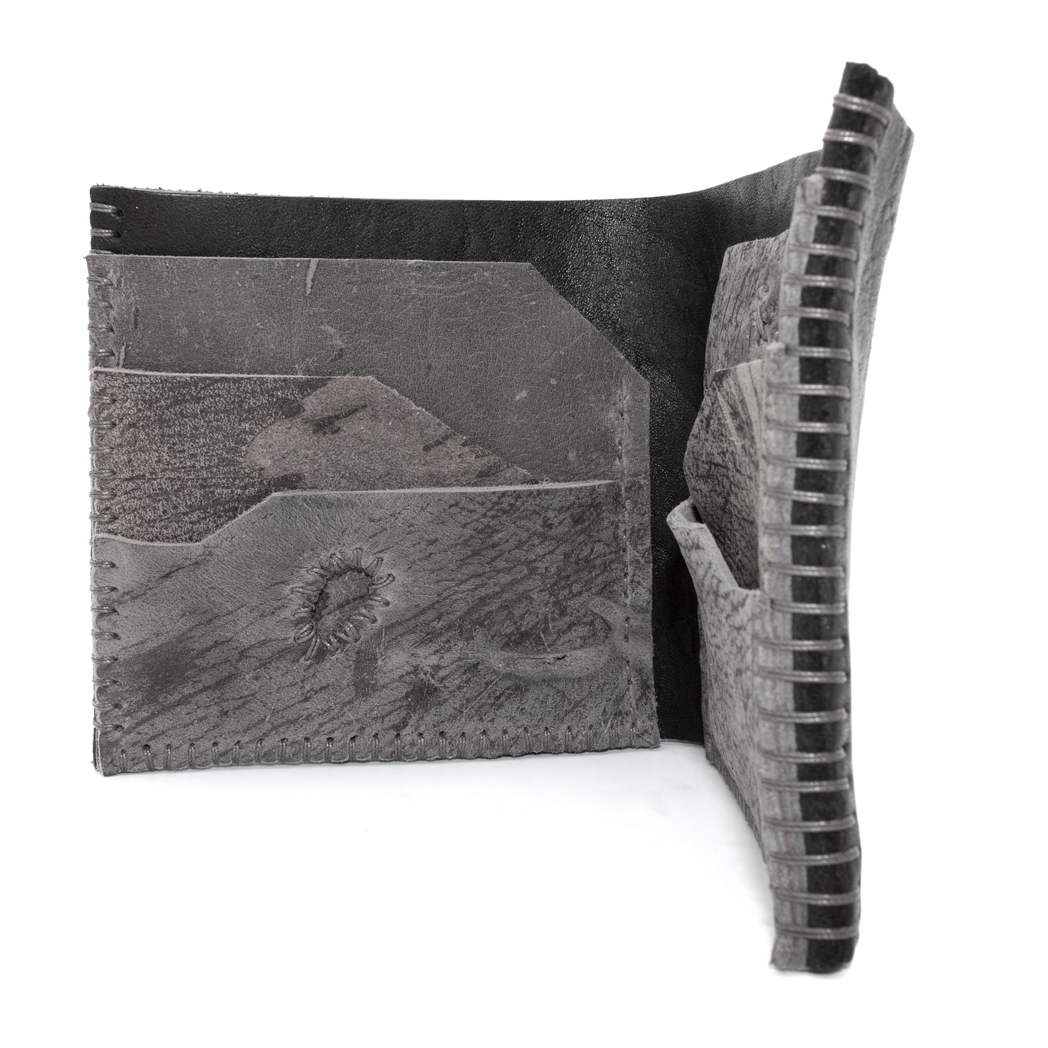 the classic wedge 6 pocket bifold wallet crafted from a supple matte black horse culatta leather with contrasting kudu leather card pockets available to buy online from artisanal leather studio atelierskn.com