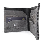 the classic wedge 6 pocket bifold wallet crafted from a supple matte black horse culatta leather with contrasting kudu leather card pockets available to buy online from artisanal leather studio atelierskn.com