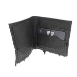 a closed seam 4 pocket bifold wallet crafted from a supple matte black washed horse leather with a closed seam construction. the wallet features a tonal rubber drip and is available to buy online from artisanal leather studio atelierskn.com