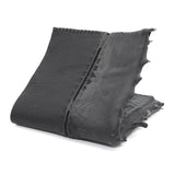 a closed seam 4 pocket bifold wallet crafted from a supple matte black washed horse leather with a closed seam construction. the wallet features a tonal rubber drip and is available to buy online from artisanal leather studio atelierskn.com