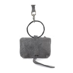 meticulously hand stitched kudu leather bag with a zipper fastening and large iron ring carry handle. an adjustable double layered shoulder strap is adorned with a distressed clip. the bag is available to buy online from uk based avant garde leather studio telierskn.com