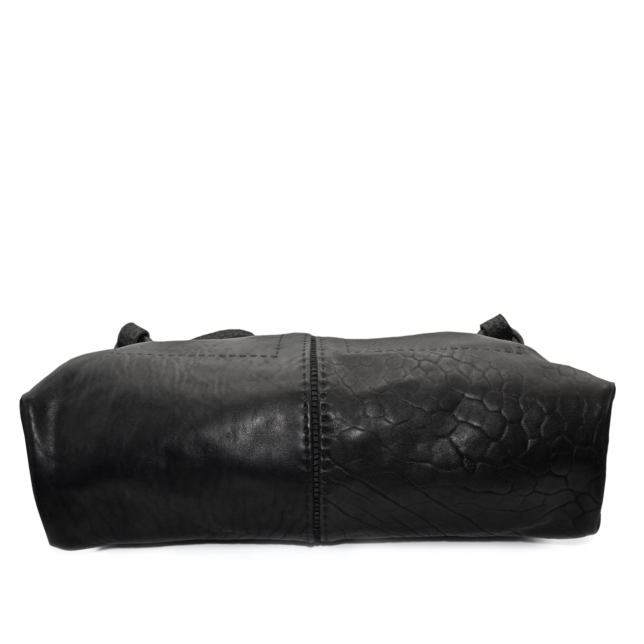 hand stitched washed horse culatta leather bag with a matte black finish. the bag features an open seam construction, riri zipper closure and hand forged iron and silver hardware available to buy online from artisanal leather studio atelierskn.com.