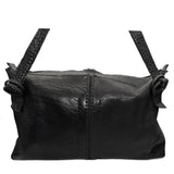 hand stitched washed horse culatta leather bag with a matte black finish. the bag features an open seam construction, riri zipper closure and hand forged iron and silver hardware available to buy online from artisanal leather studio atelierskn.com.