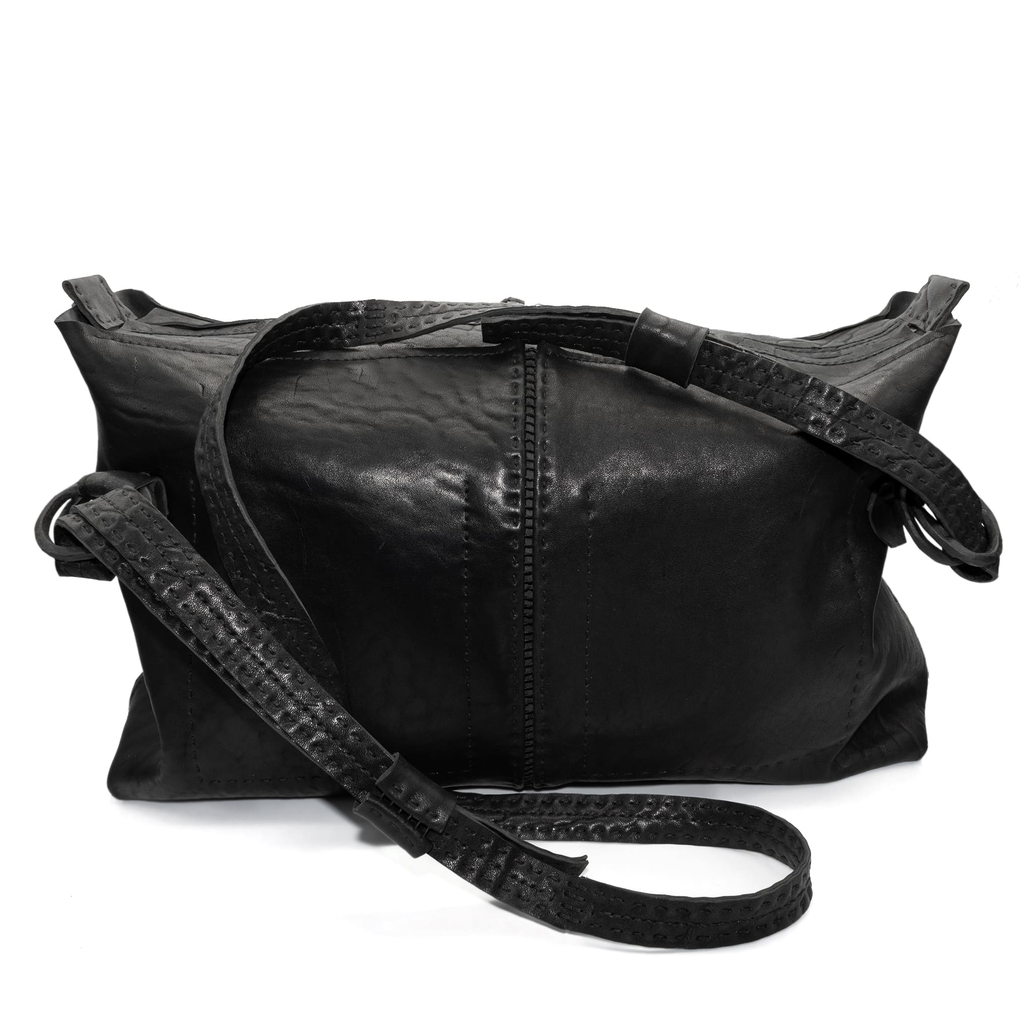 hand stitched washed horse culatta leather bag with a matte black finish. the bag features an open seam construction, riri zipper closure and hand forged iron and silver hardware available to buy online from artisanal leather studio atelierskn.com.