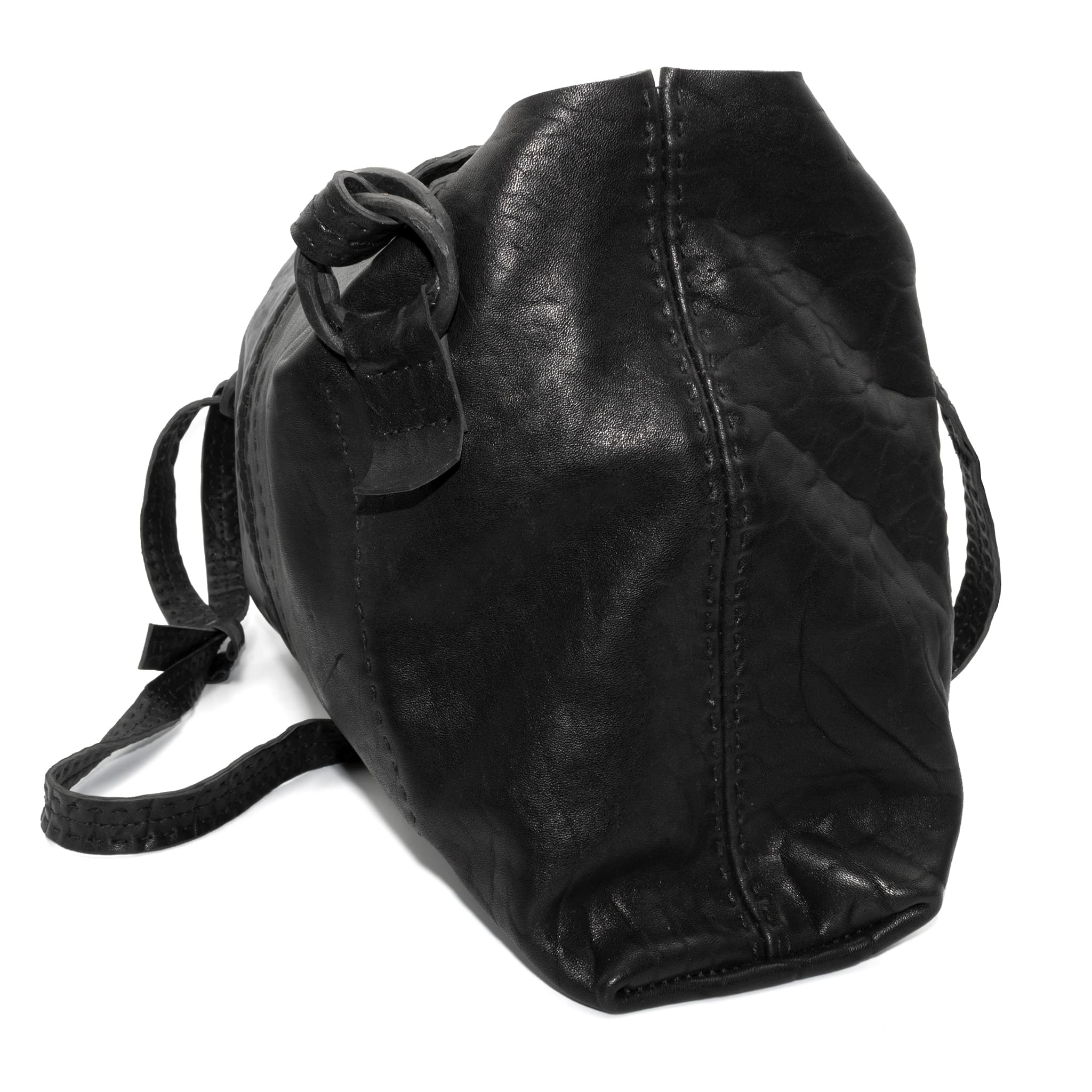 hand stitched washed horse culatta leather bag with a matte black finish. the bag features an open seam construction, riri zipper closure and hand forged iron and silver hardware available to buy online from artisanal leather studio atelierskn.com.