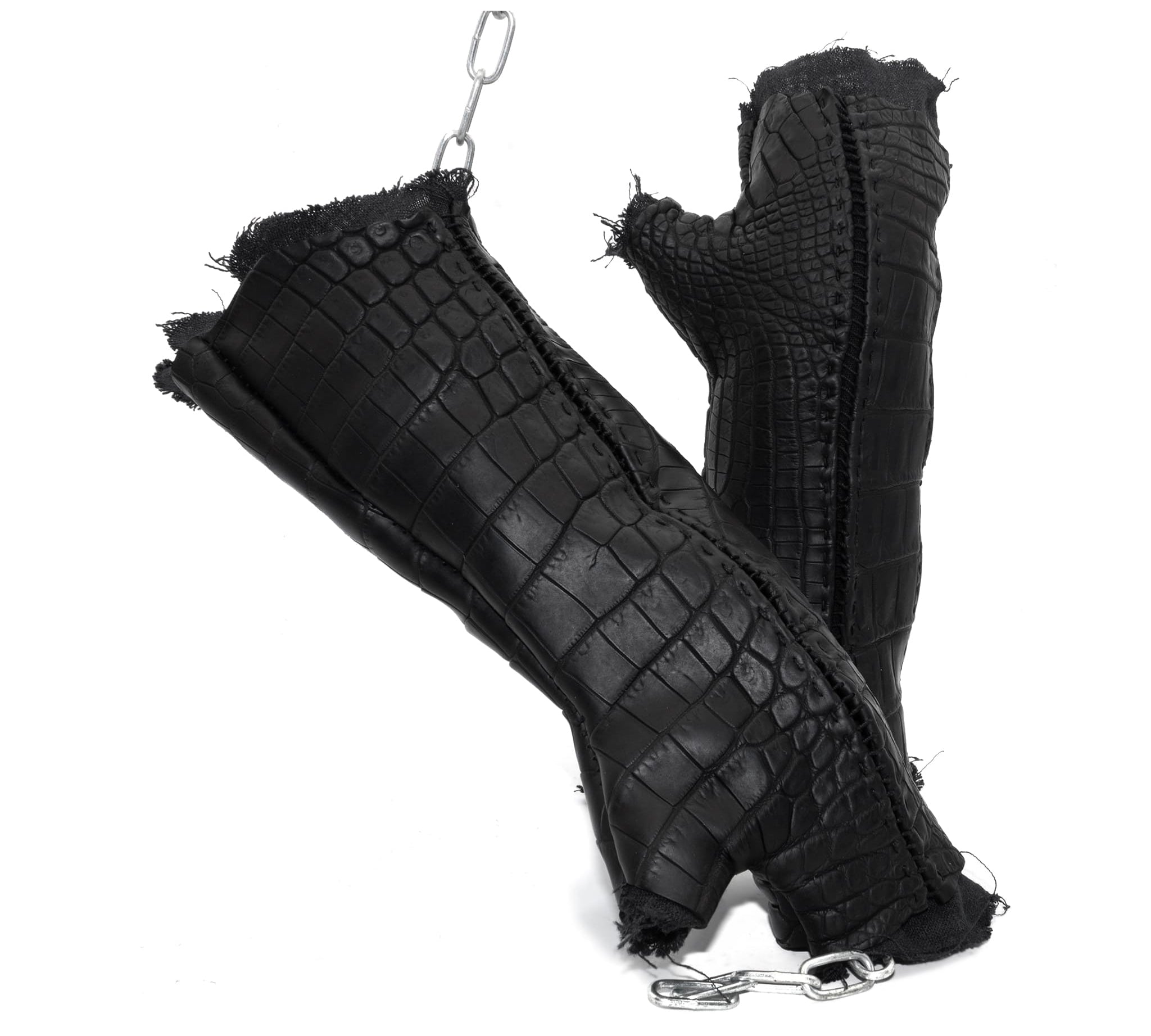 hand stitched over a 40hr period the genuine crocodile leather gloves feature deconstructed open seam panels, and a raw cut stone washed ramie lining. with an object dyed finish the gloves are then wet moulded on the body over an 8 hour period for a sculptured aesthetic. the gloves are available to buy online from avant garde leather studio atelierskn.com
