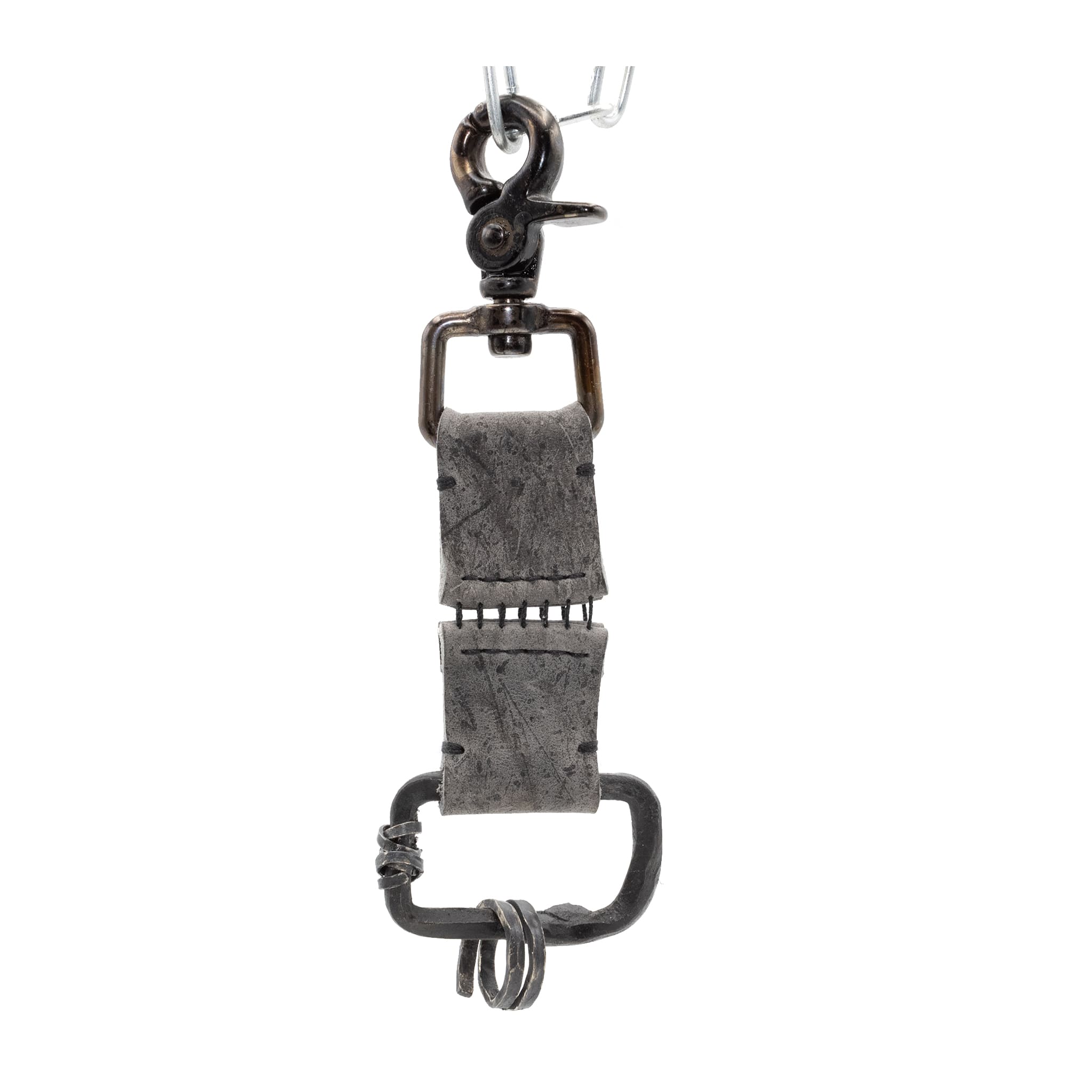 the hand sewn kudu leather keychain features a soft grey dye treatment and a distressed lobster swivel clip. a hand forged black iron ring holds the oxidised .925 silver key ring. Buy online from avant garde leather studio atelier skn.