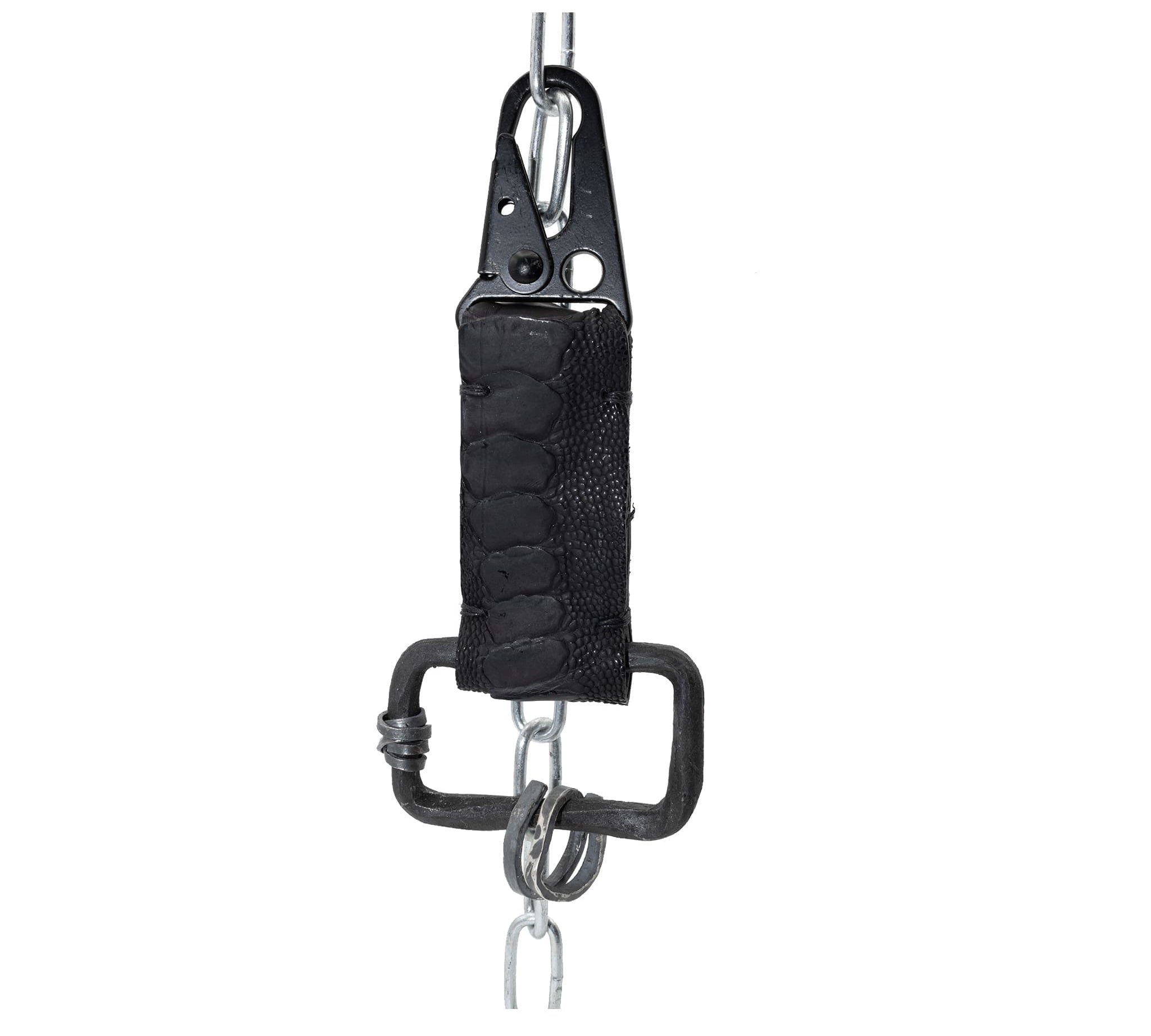 the hand sewn ostrich leather keychain features a flat matte black dye treatment and a distressed military sling clip. a hand forged black iron ring holds the oxidised .925 silver key ring. Buy online from avant garde leather studio atelier skn.