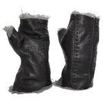 hand stitched over a 35hr period the washed kangaroo leather gloves feature deconstructed open seam panels, and an object dyed raw silk floating lining. the gloves are available to buy online from avant garde leather studio atelierskn.com