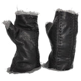 hand stitched over a 35hr period the washed kangaroo leather gloves feature deconstructed open seam panels, and an object dyed raw silk floating lining. the gloves are available to buy online from avant garde leather studio atelierskn.com
