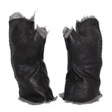 hand stitched over a 35hr period the washed kangaroo leather gloves feature deconstructed open seam panels, and an object dyed raw silk floating lining. the gloves are available to buy online from avant garde leather studio atelierskn.com