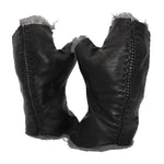 hand stitched over a 35hr period the washed kangaroo leather gloves feature deconstructed open seam panels, and an object dyed raw silk floating lining. the gloves are available to buy online from avant garde leather studio atelierskn.com