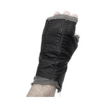 hand stitched over a 35hr period the washed kangaroo leather gloves feature deconstructed open seam panels, and an object dyed raw silk floating lining. the gloves are available to buy online from avant garde leather studio atelierskn.com