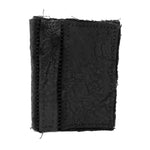 object dyed matte black reverse horse culatta leather cardholder, hand stitched over an 18 hour period without the use of machines. the leather bifold card case features multiple card slots, and a french linen lining. an open seam construction is hand stitched in a japanese linen thread. the wallet is available to buy online from avant garde leather studio atelierskn.com