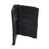 object dyed matte black reverse horse culatta leather cardholder, hand stitched over an 18 hour period without the use of machines. the leather bifold card case features multiple card slots, and a french linen lining. an open seam construction is hand stitched in a japanese linen thread. the wallet is available to buy online from avant garde leather studio atelierskn.com