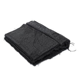 object dyed matte black reverse horse culatta leather cardholder, hand stitched over an 18 hour period without the use of machines. the leather bifold card case features multiple card slots, and a french linen lining. an open seam construction is hand stitched in a japanese linen thread. the wallet is available to buy online from avant garde leather studio atelierskn.com